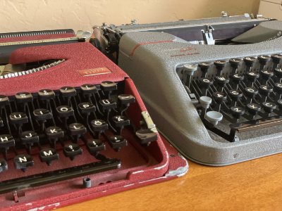 1950 Gossen Tippa and 1952 Hermes Baby typewriters side-by-side